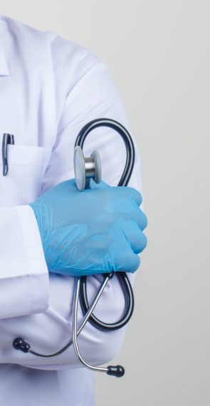 doctor-crossing-arms-while-holding-stethoscope-white-coat